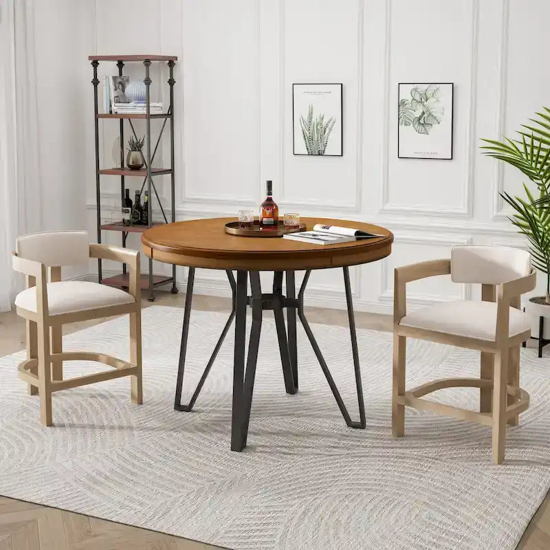Three-piece bar stool set, featuring plush upholstered chairs and metal table legs.