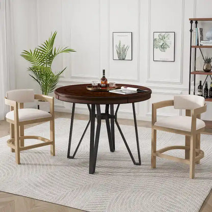 Three-piece bar stool set, featuring plush upholstered chairs and metal table legs.