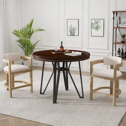 Three-piece bar stool set, featuring plush upholstered chairs and metal table legs.