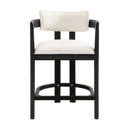 Three-piece bar stool set, featuring plush upholstered chairs and metal table legs.