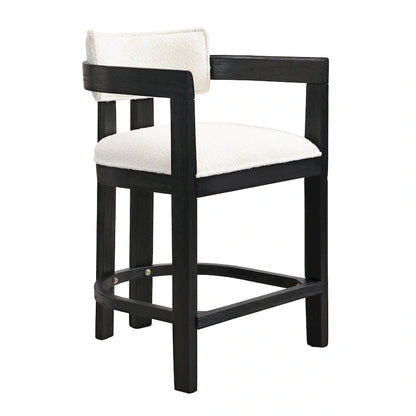 Three-piece bar stool set, featuring plush upholstered chairs and metal table legs.