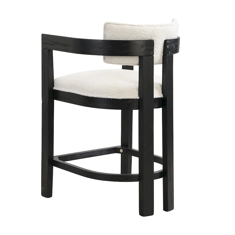 Three-piece bar stool set, featuring plush upholstered chairs and metal table legs.