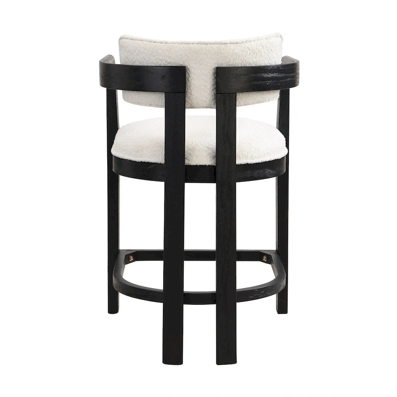 Three-piece bar stool set, featuring plush upholstered chairs and metal table legs.