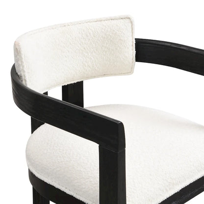 Three-piece bar stool set, featuring plush upholstered chairs and metal table legs.