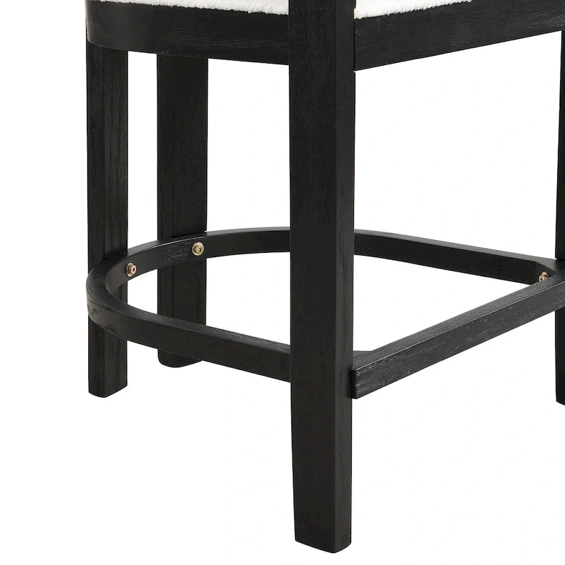 Three-piece bar stool set, featuring plush upholstered chairs and metal table legs.