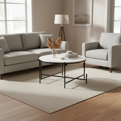 Modern handcrafted coffee table in marble and matte metal