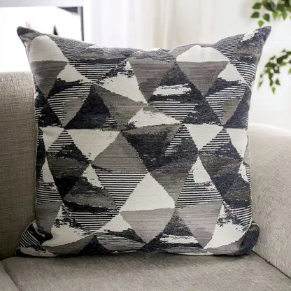 Traditional light gray chenille upholstered roll-up armchair