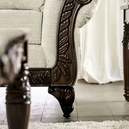Traditional light gray chenille upholstered roll-up armchair